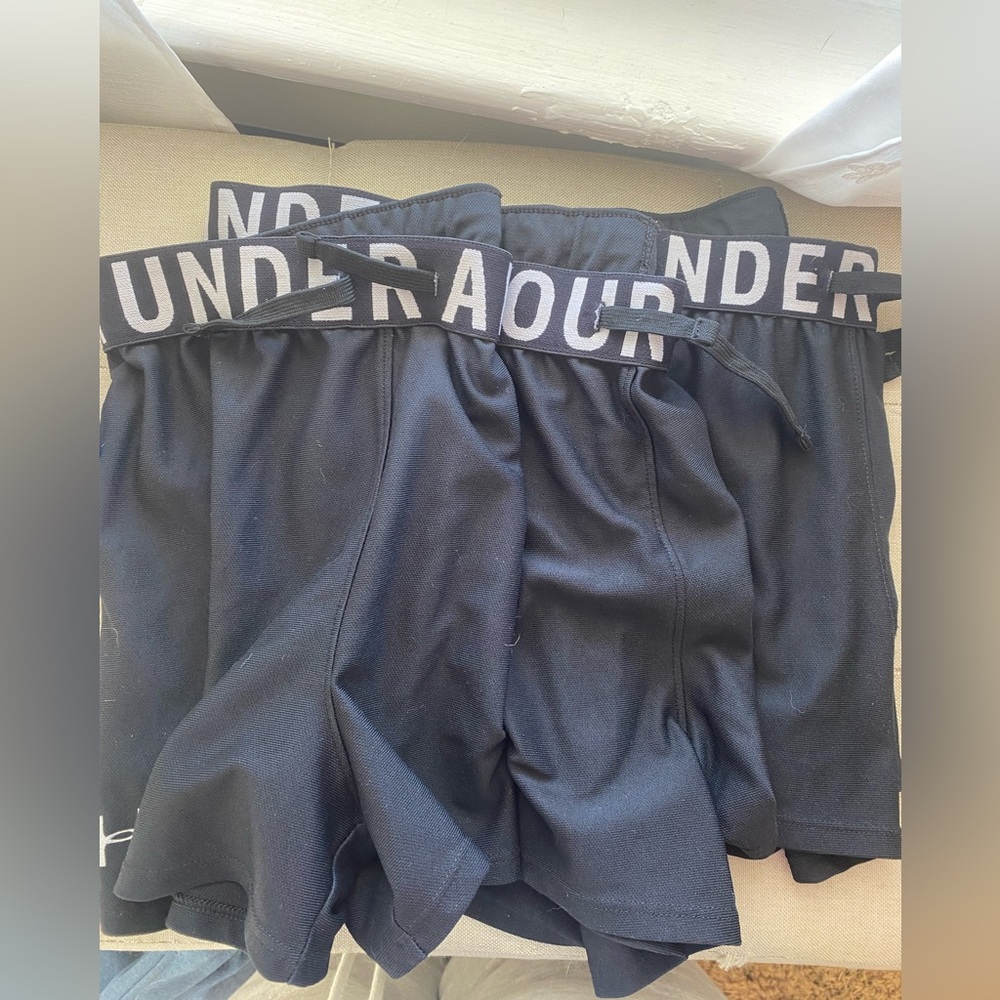 Pair of 3 identical black under armor athletic shorts